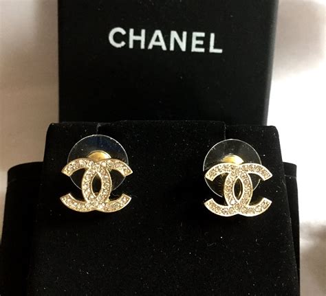 chanel white gold cc logo earrings